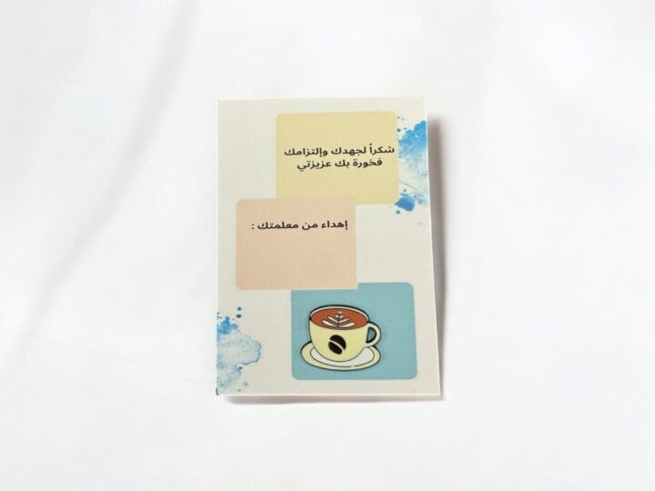 Coffee pin favor in Kuwait – badge on soft-colored card for any occasion